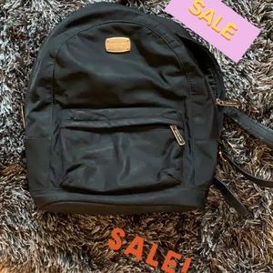 SOLD Micheal Kors bookbag, black and gold
